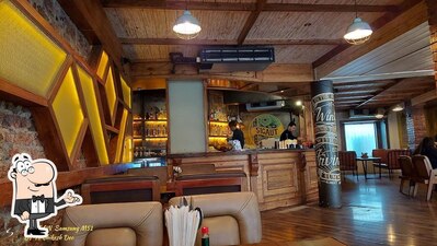 Take a seat at one of the tables at Effingut Koregaon Park - Pune's most loved craft beer pub