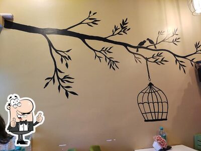 Enjoy a drink at Bandhu Cafe