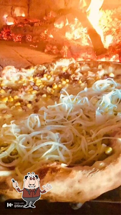 Platos en Tchelos pizzaria
