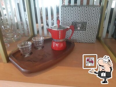 Siediti a un tavolo di Caffe Pascucci Shop