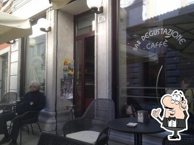 Siediti a un tavolo di Bar Degustazione Caffè