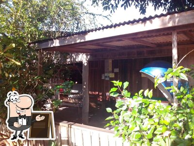 Você pode espairecer no na área externa do Bar Do Nivaldo