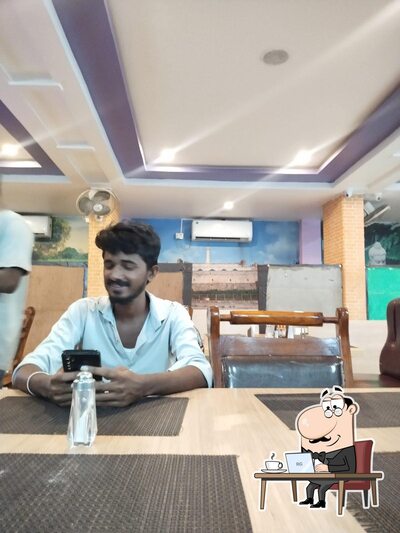 Take a seat at one of the tables at Rayalaseema Spice Land