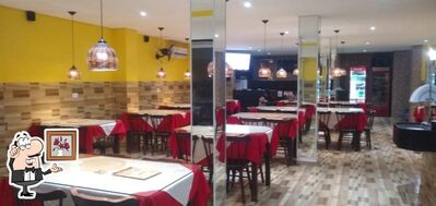 O interior do Pizzaria da hora