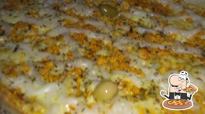 No Ponto do Pastel e Pizzaria, você pode desfrutar de pizza