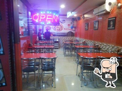 Take a seat at one of the tables at Real Paprika