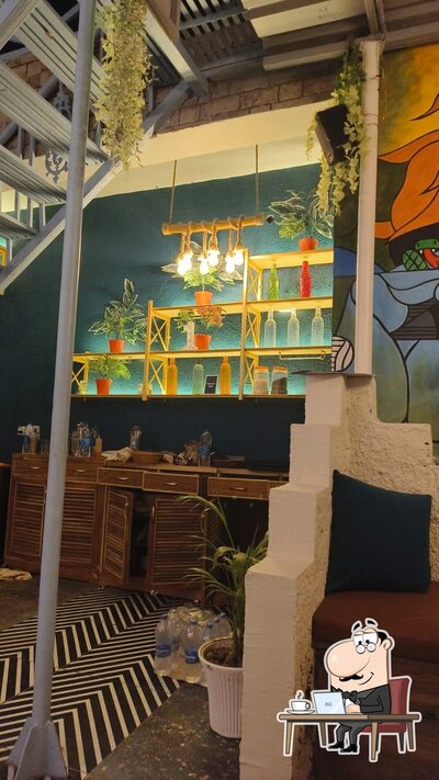The interior of Girnar Rooftop Restra ( Restaurant )