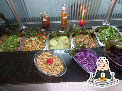 Comida em Restaurante Tchê