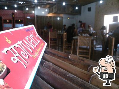 Take a seat at one of the tables at Sangwari