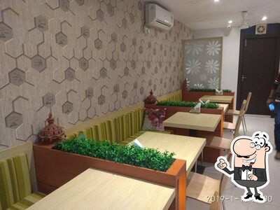 Take a seat at one of the tables at Zorba