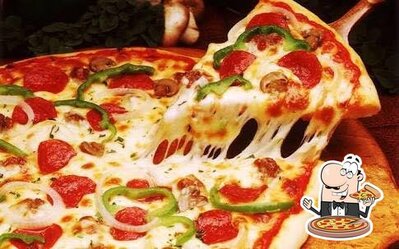 Try out pizza at Green cafe