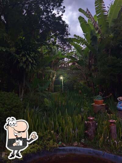 Você pode espairecer no exterior Restaurante Ao Pé da Serra