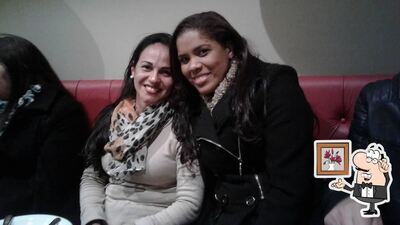 O interior do Tortelli Pizzaria