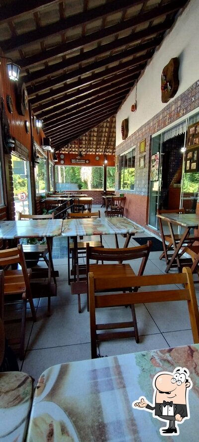 Sente em uma das mesas no Miltinho Restaurante - Penedo