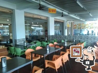 Take a seat at one of the tables at Kabab World