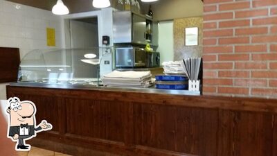 Siediti a un tavolo di Pizzeria Spaghetteria FULL BLOWN