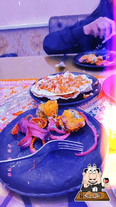 Get pizza at Delhi Lazeez Darbar