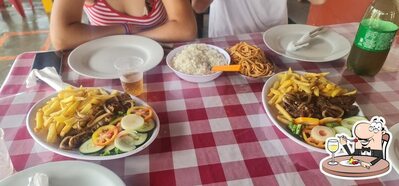 Comida em Restaurante e pizzaria TALISMÃ