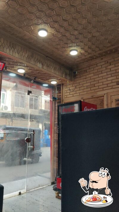 Get pizza at Halal delights pizza & restaurant