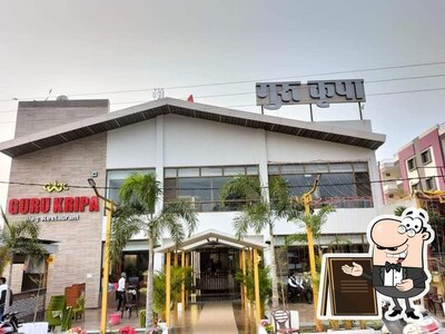 The exterior of Guru Kripa Rau -Since 1987