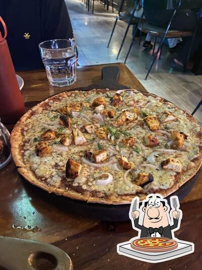 Try out pizza at PitStop Brew Pub