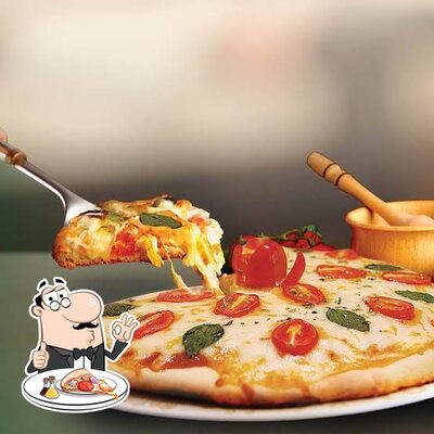 No Pizzaria Mari, você pode provar pizza