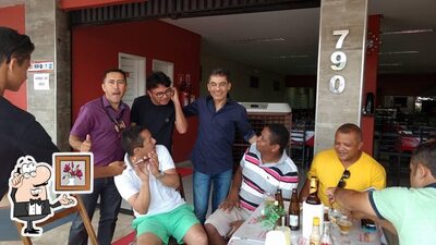 Sente em uma das mesas no ARKUS Restaurante Picos PI