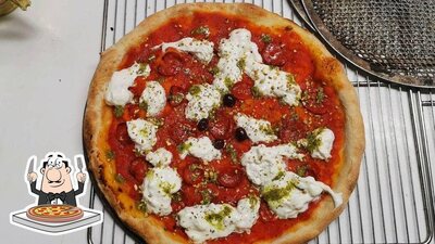 A Restaurant CASA PAVONI, vous pouvez essayer des pizzas