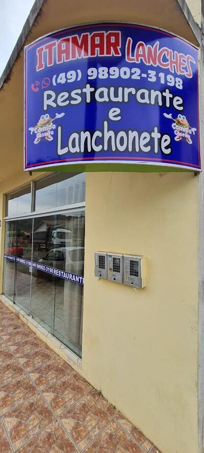 A publicidade apresenta informações sobre o Restaurante Itamar Lanches
