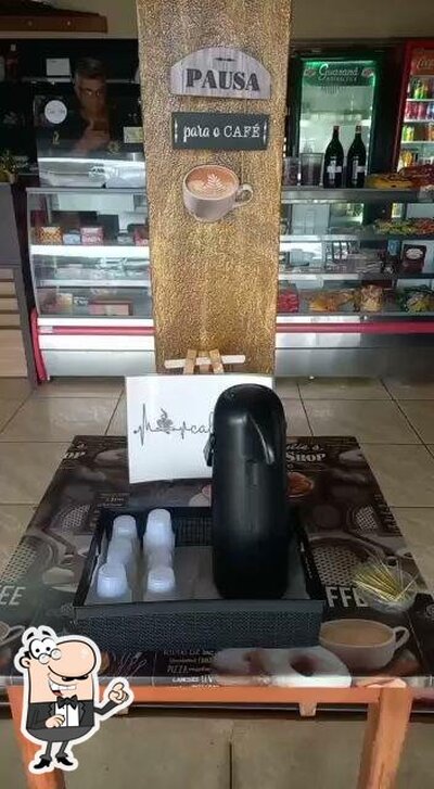 Sente em uma das mesas no Restaurante Costelão