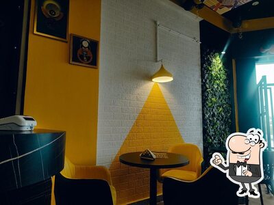 Take a seat at one of the tables at High Bros Cafe