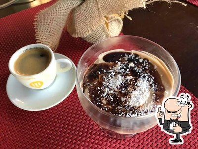 Desfrute de uma bebida no Il Divino Café