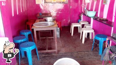 Take a seat at one of the tables at Siva Fast Food