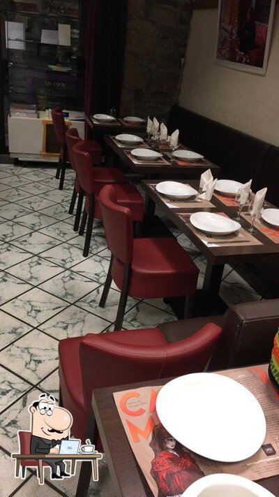 Installez-vous à l'une des tables de Restaurant Marrakech Roma