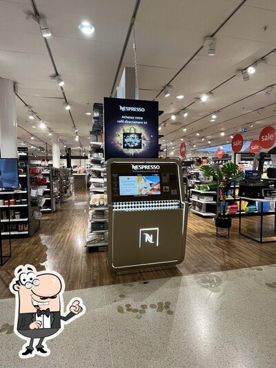 Siediti a un tavolo di Nespresso Point