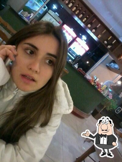 Sente em uma das mesas no Restaurante E Pizzaria Dom Pedro