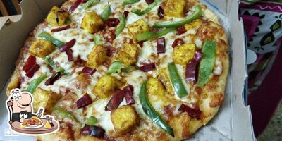 Try out pizza at Domino's Pizza