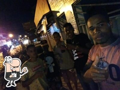 Você pode espairecer no na área externa do Bar Do Denilson