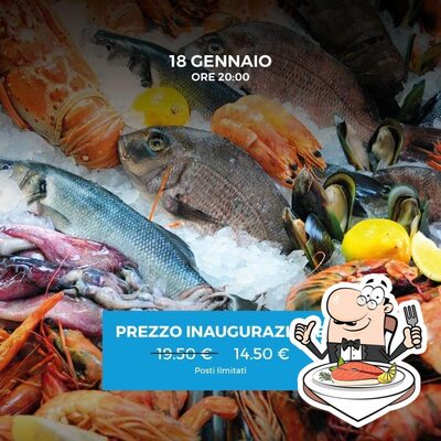 Ordina i piatti di pesce al ristorante Ristorante Pisana