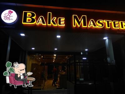 Take a seat at one of the tables at Bake Master 2.0 (Bakery&Restuarant)