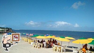 Sente em uma das mesas no Restaurante do Nil