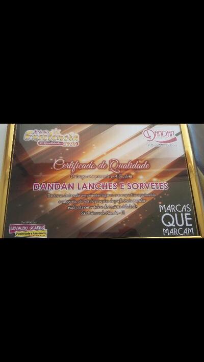 A publicidade apresenta informações sobre o Dandan Lanches
