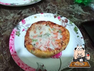 At Tapan Sweets & Bakery, you can taste pizza