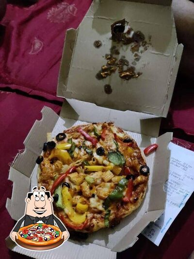 At Domino's Pizza Sector 22, Gurgaon, you can try pizza