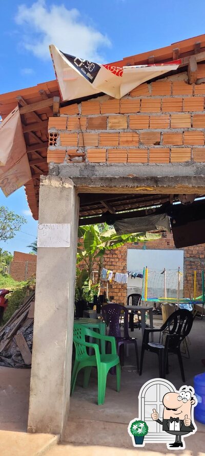 a área exterior é uma característica importante do Boteco CANTINHO da JOANA