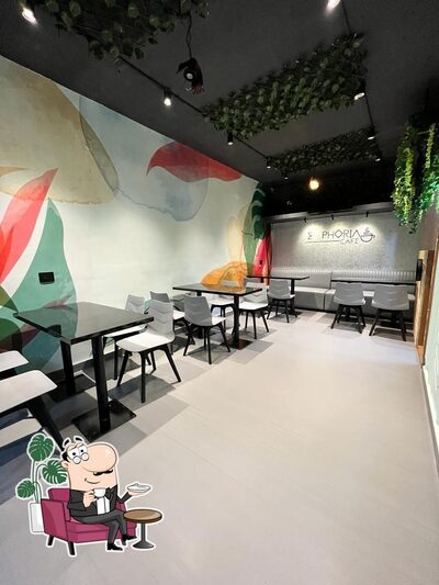 Take a seat at one of the tables at EUPHORIA CAFE