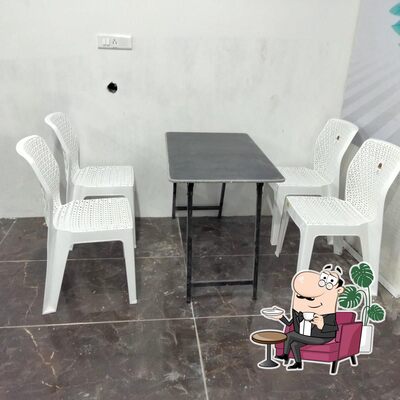 Take a seat at one of the tables at Food Time