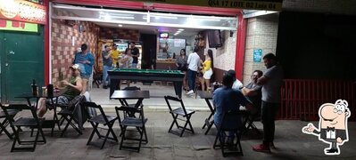 Sente em uma das mesas no Buteco Teu Vizin - Taguatinga Sul