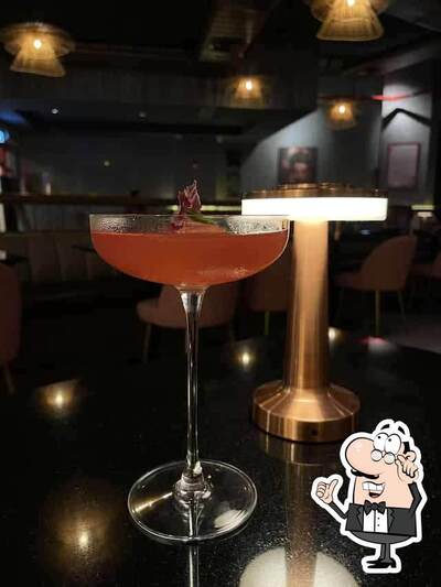 Take a seat at one of the tables at Kampai - Dlf Promenade
