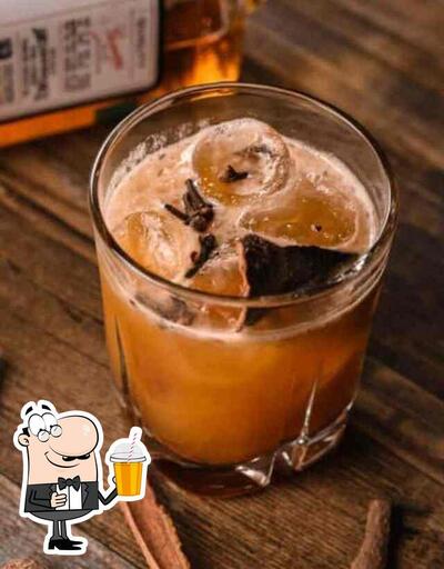 Enjoy a drink at Tipsy Tales Bar Terminal